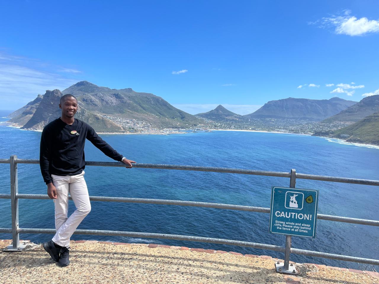 Guide overlooking Hout Bay from the Chapman's Peak Drive viewpoint