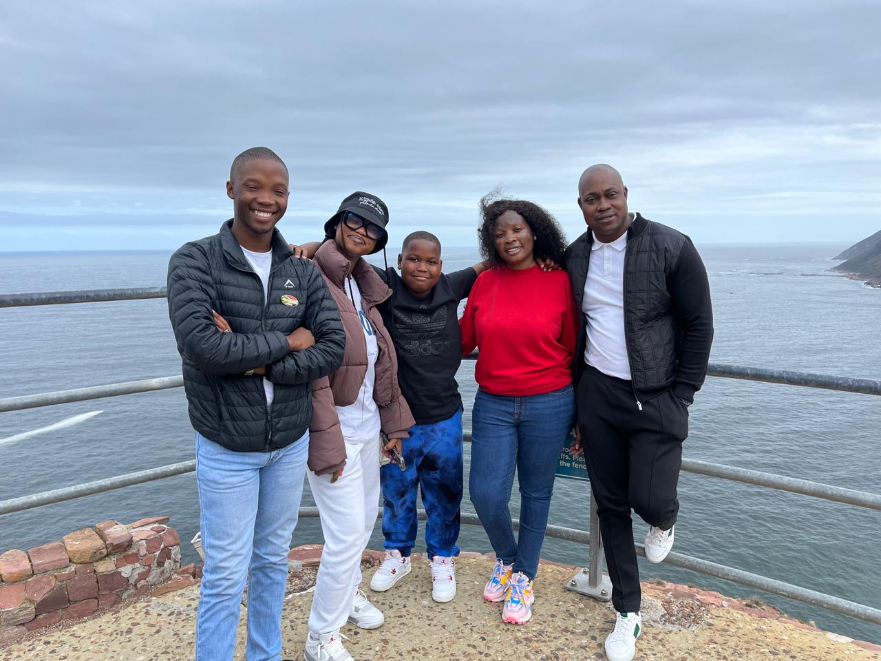Family group at a coastal viewpoint along the Garden Route