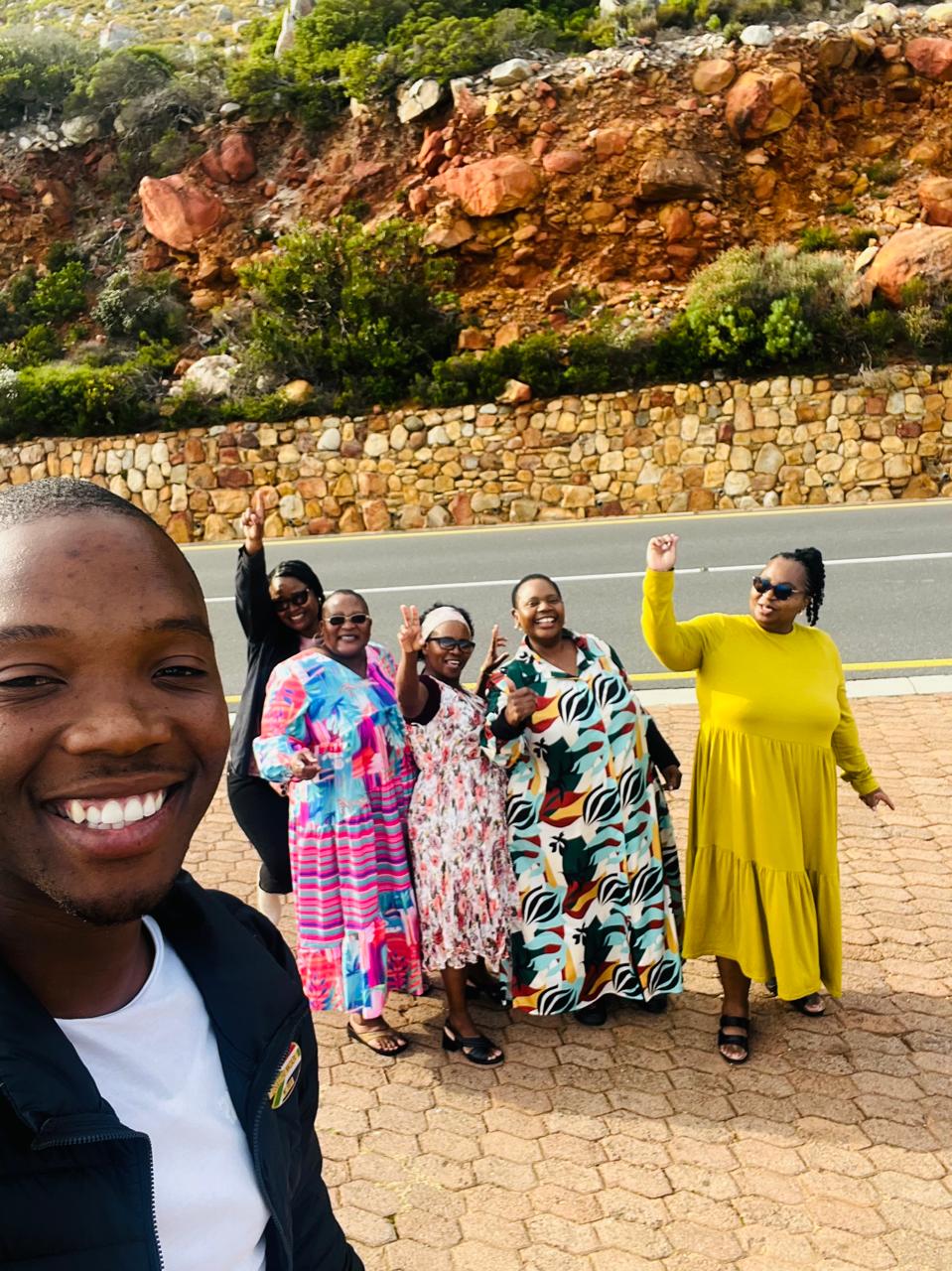 Guide and group enjoying the view along Chapman's Peak Drive