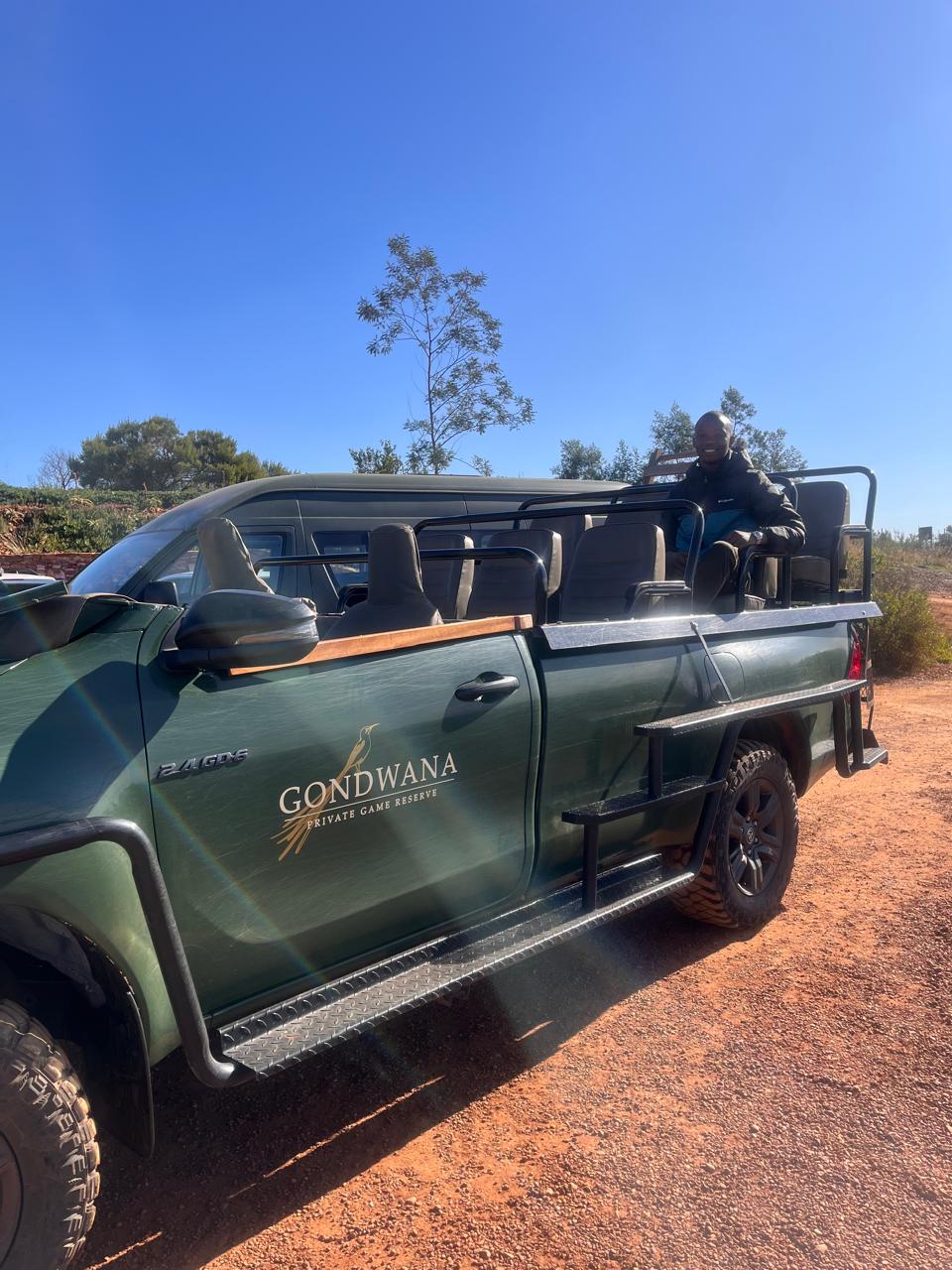 Guide seated in an open safari vehicle at a private game reserve